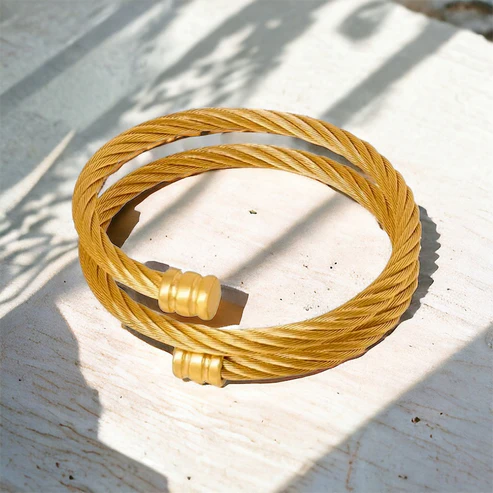 Gold twisted steel bracelet DE-BR206